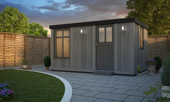 An image of a small garden office in the evening.