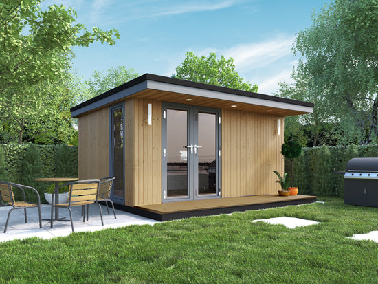 A garden office with a table and chairs outside.