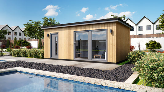 Modern small Annexe with composite cladding, designed as an Annexe Style Bespoke by Rubicon Garden Rooms adjacent to an outdoor swimming pool.